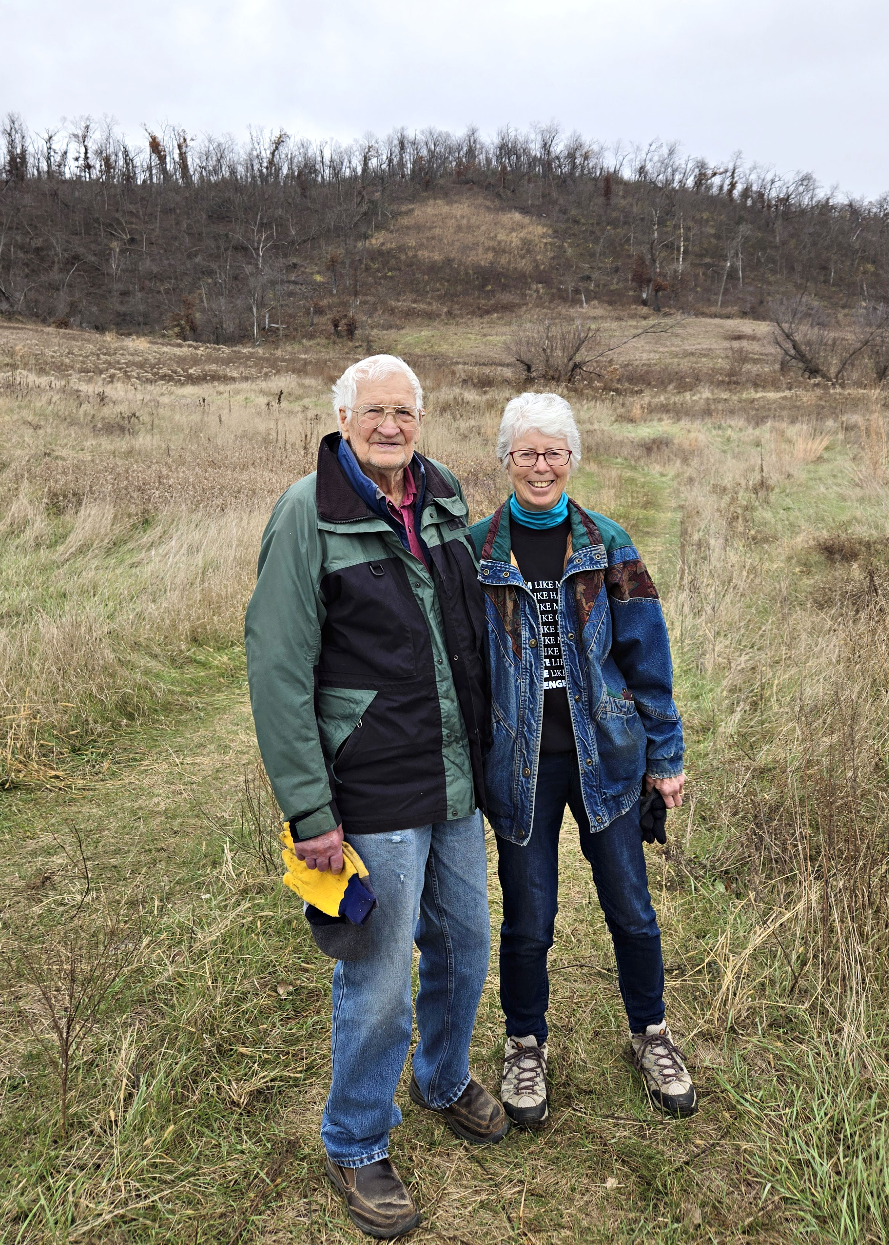 Jim and Rose Sime with Bald Bluff behind
