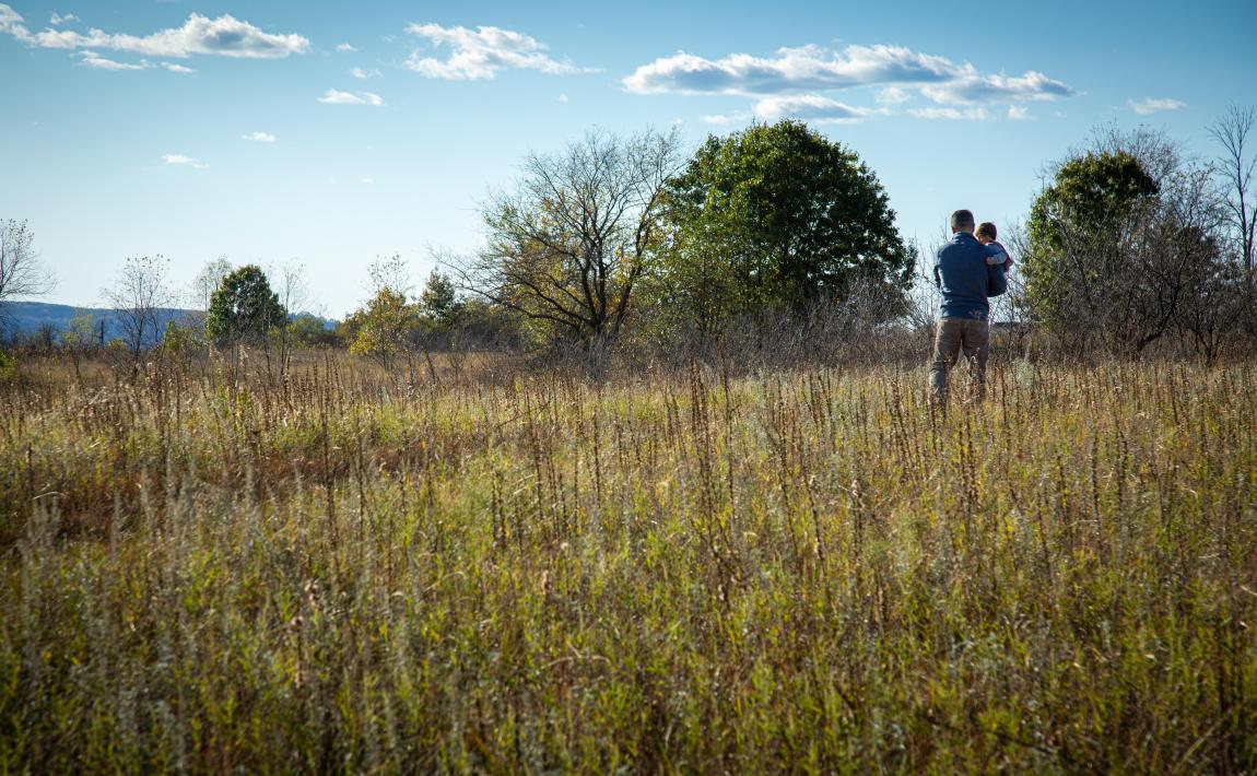 parent and child on prairie