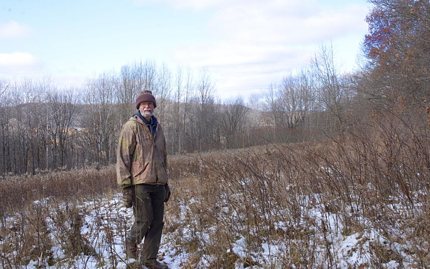 Lennie Lichter surveying his 101-acre wildlife haven