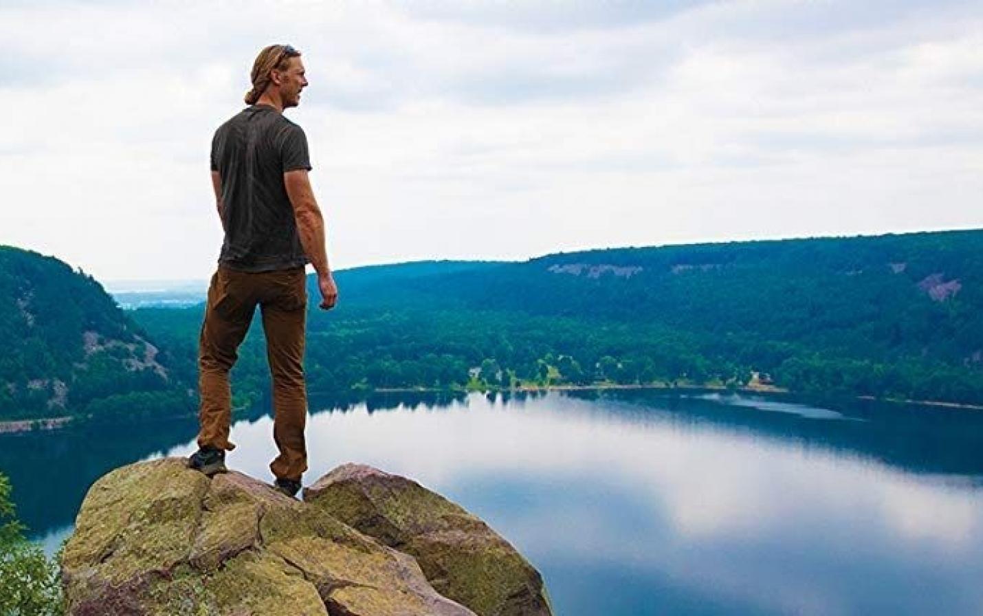 Man overlooking a body of water