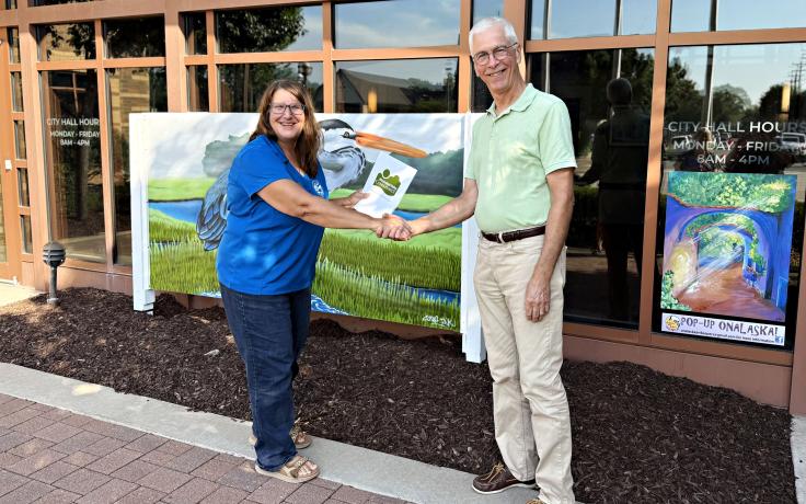 City of Onalaska Mayor Kim Smith and Conservancy president Allan Beatty